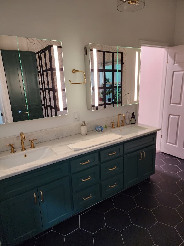 Stone Oak master bathroom after — frameless glass walk-in shower with large-format tile